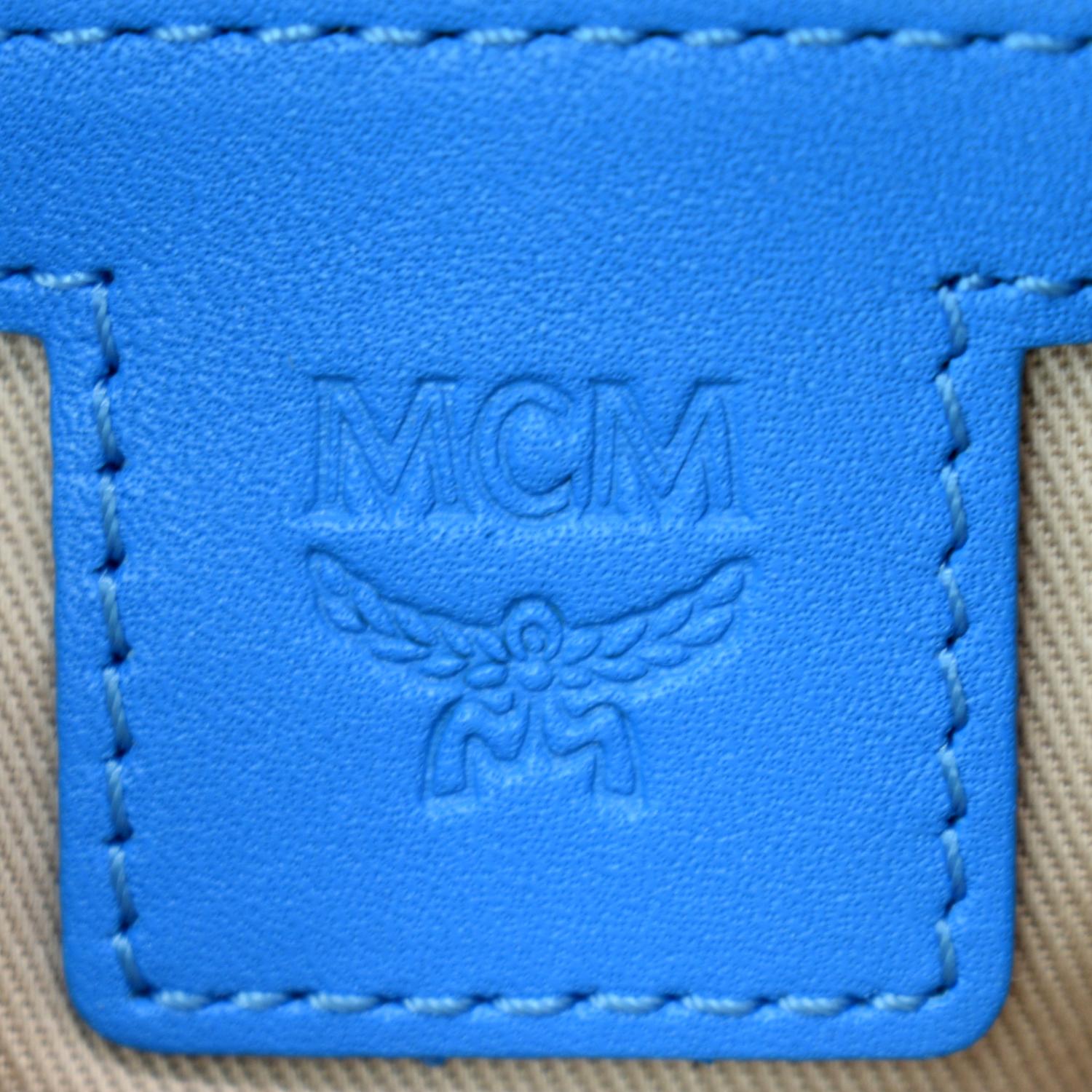 MCM Visetos Leather Clutch Bag (pre-owned) in Blue