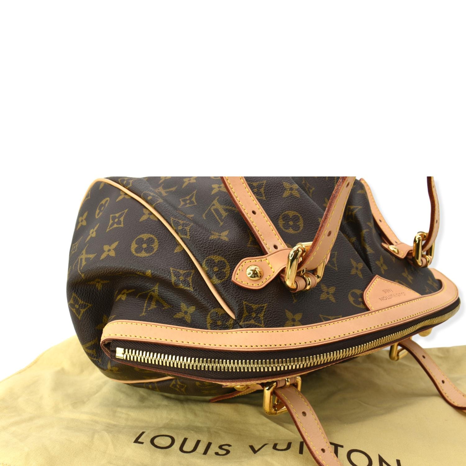 Louis Vuitton Tivoli GM. Long curved zipper allows the bag to open wid