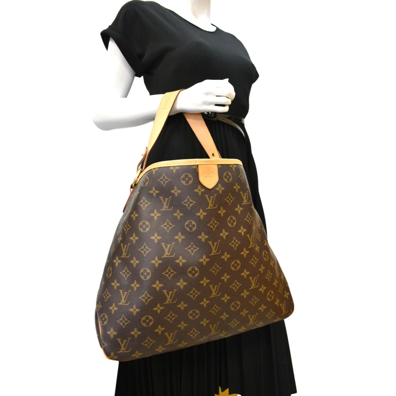 Delightful vinyl handbag Louis Vuitton Brown in Vinyl - 33424883