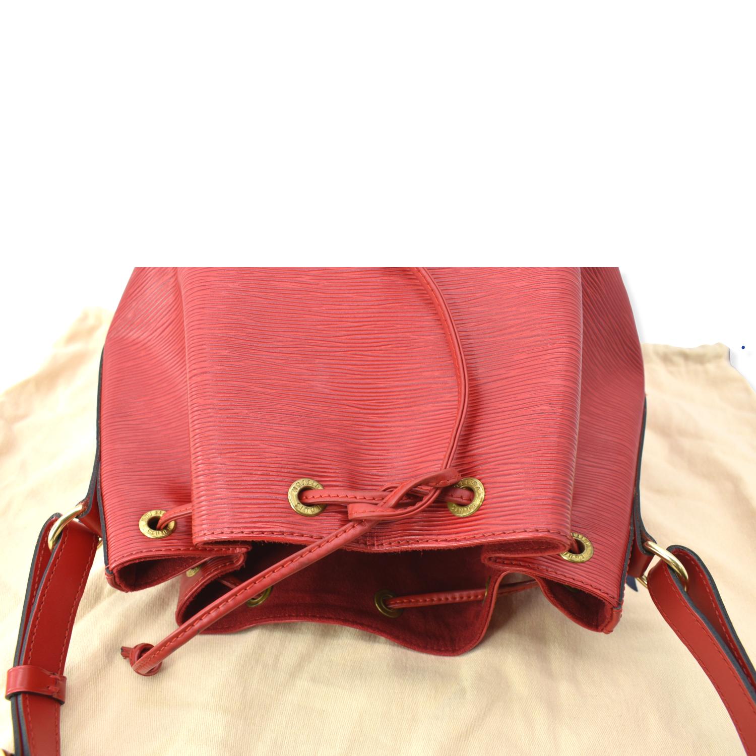 Louis Vuitton Noe Red PM Epi Leather Shoulder Bag, with red stitching and  brass hardware, opening to a black suede interior with key ring, the strap  w sold at auction on 12th