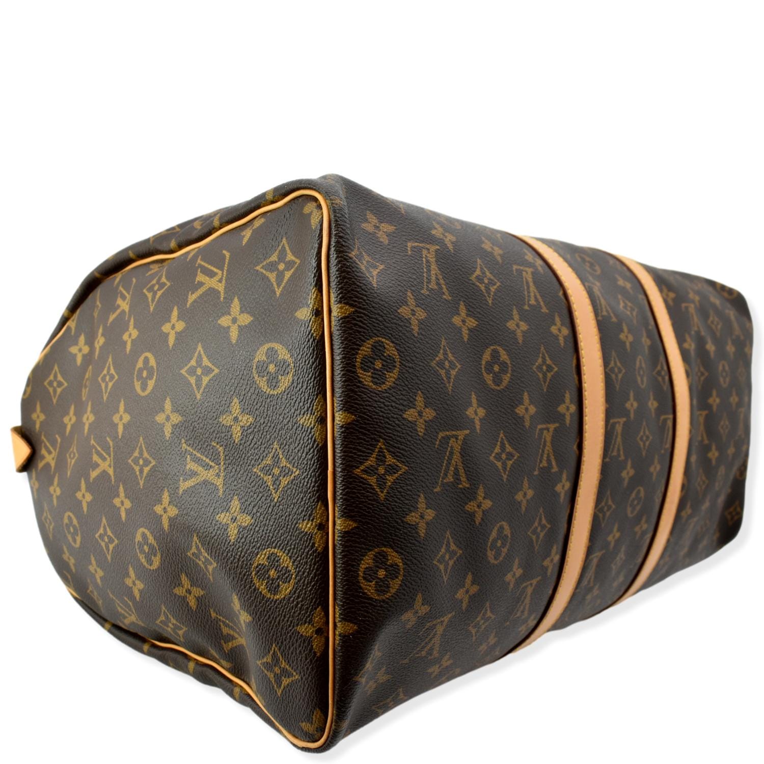 LOUIS VUITTON KEEPALL 50 TRAVEL BAG, monogram canvas with full top double  zip closure, two top handles with leather trims and leather tag with  B.T.R.W. initials, 50cm x 27cm x 22cm.