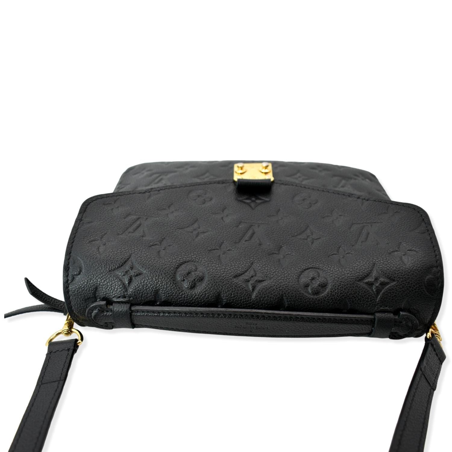 Louis Vuitton • Black Pochette Métis Monogram Empreinte Leather. Pre-owned,  slight wear throughout corners. Comes with Original Dustbag…