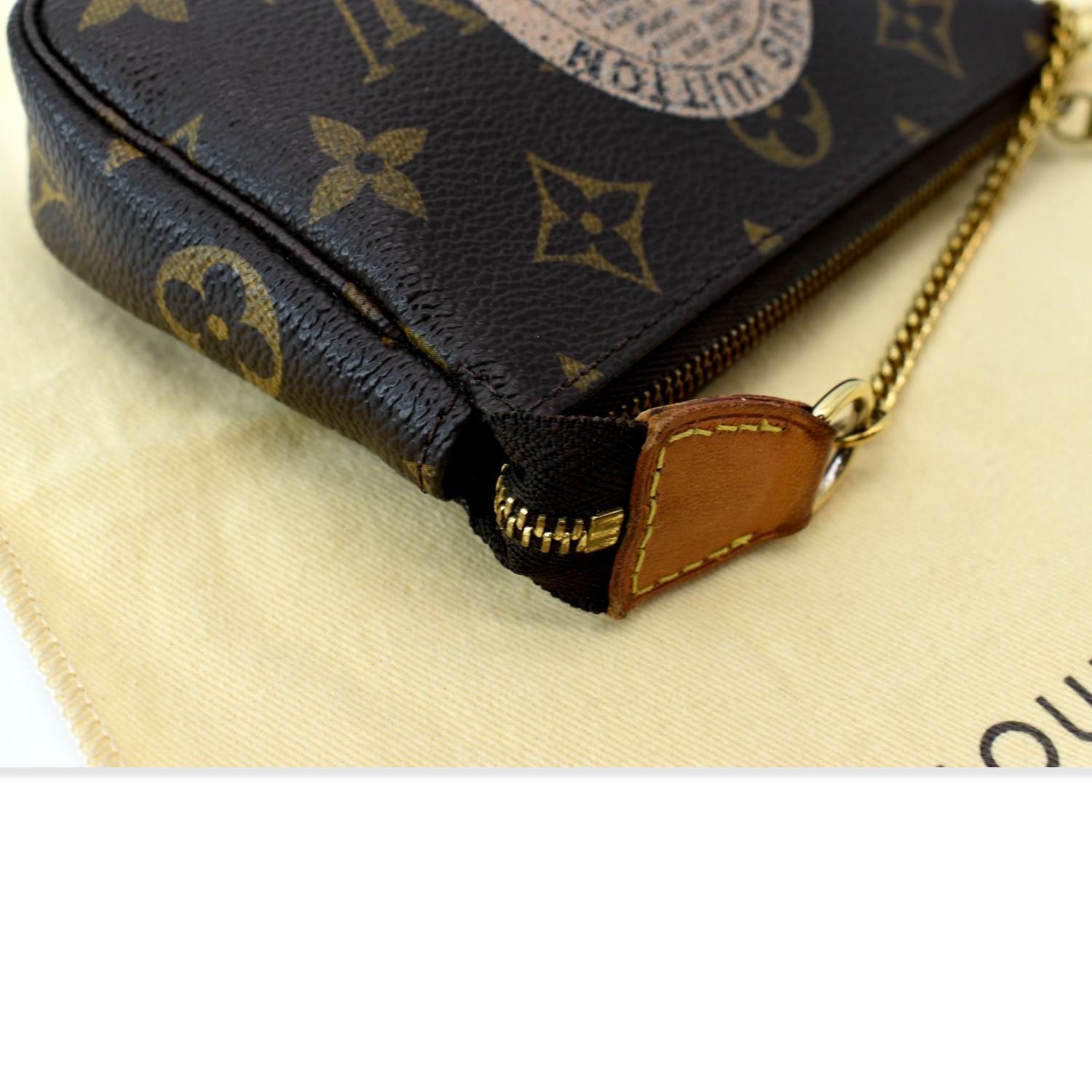 Louis Vuitton Pre-Owned 2007 pre-owned Mini Pochette Accessoires clutch bag - Brown