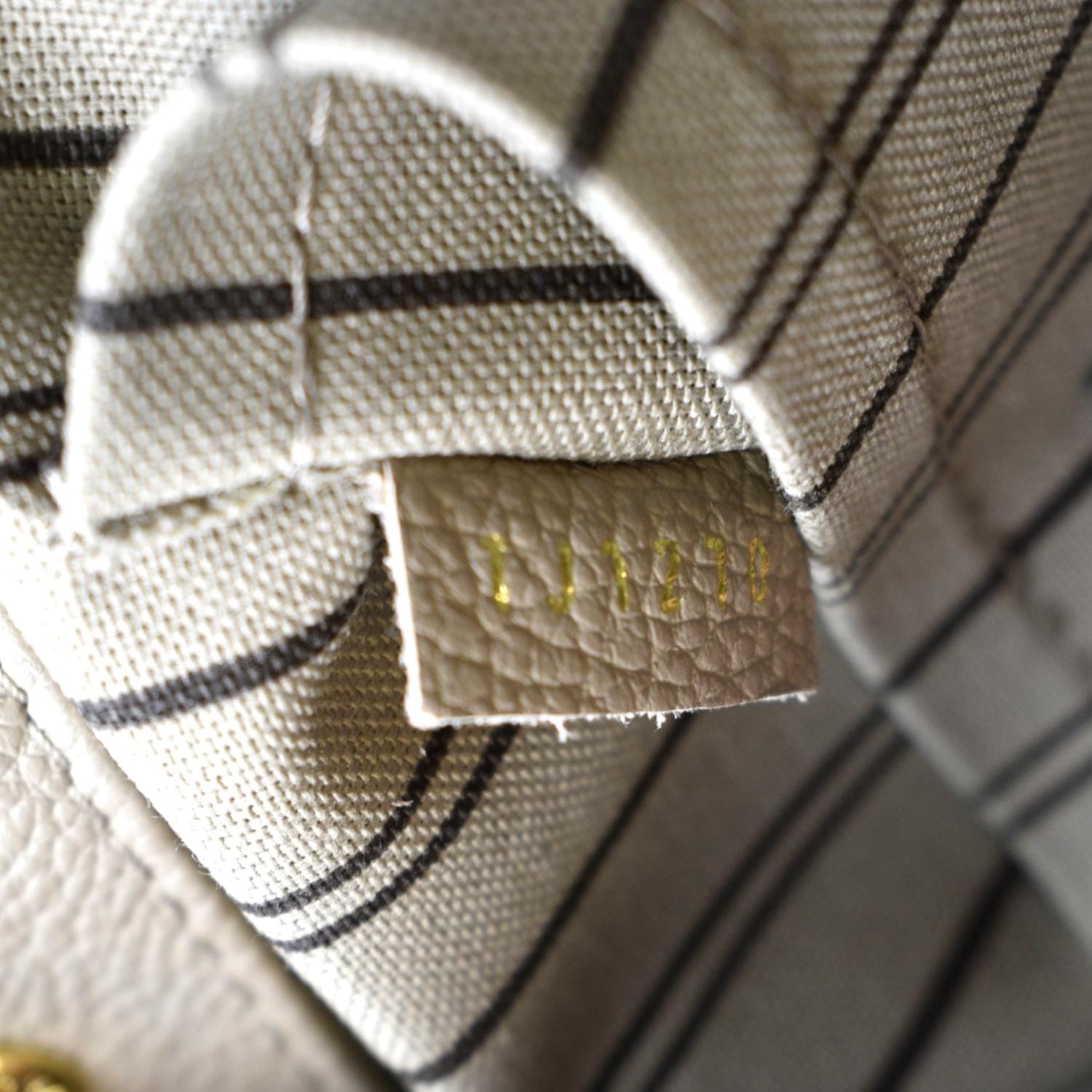 Louis Vuitton Montaigne MM Empreinte Tourterelle Grey ○ Labellov