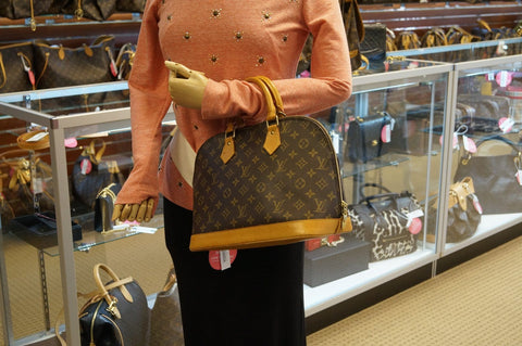 LOUIS VUITTON Monogram Canvas Alma Satchel