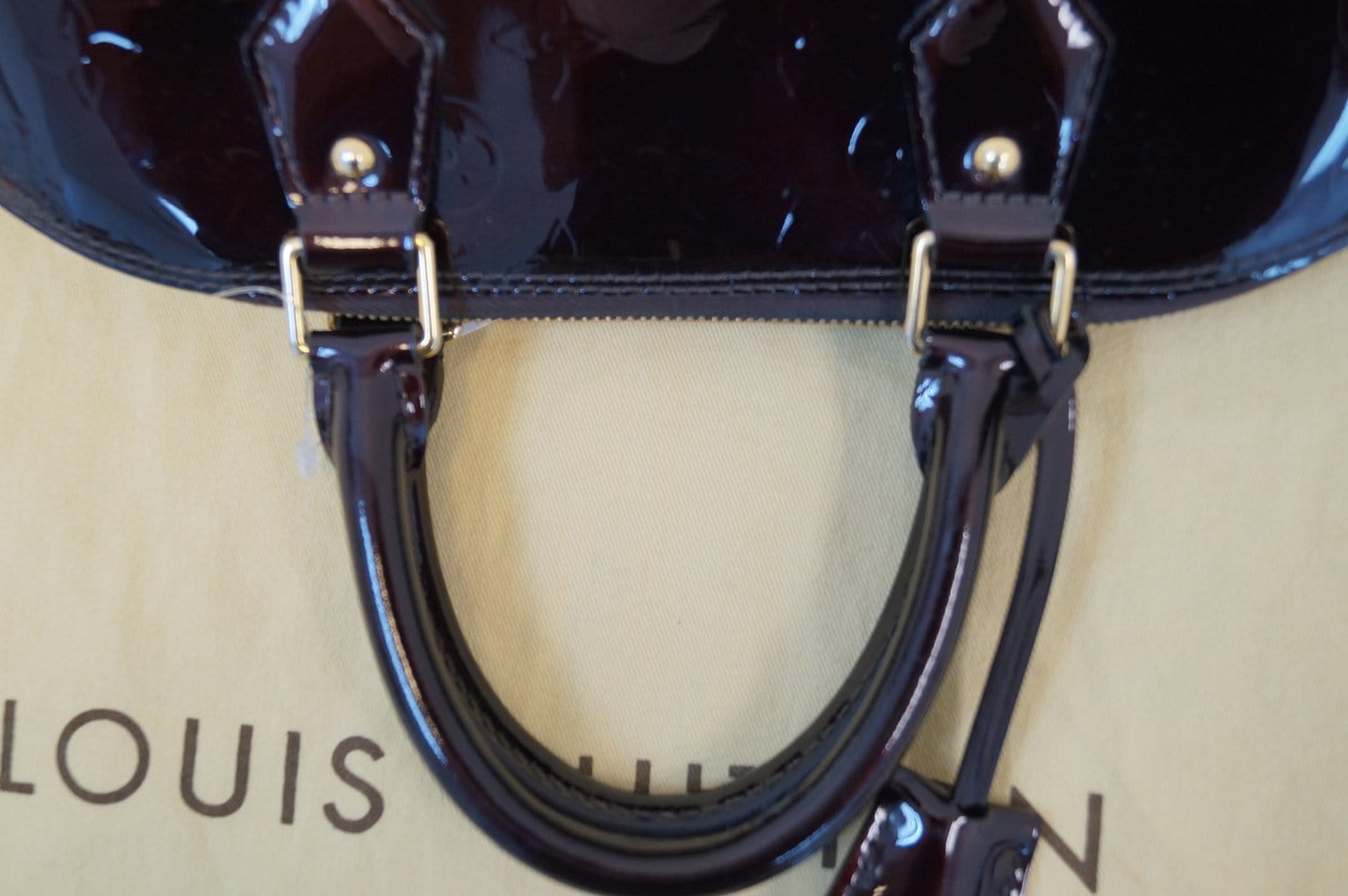 Authentic Louis Vuitton Amarante Monogram Vernis Alma PM Bag