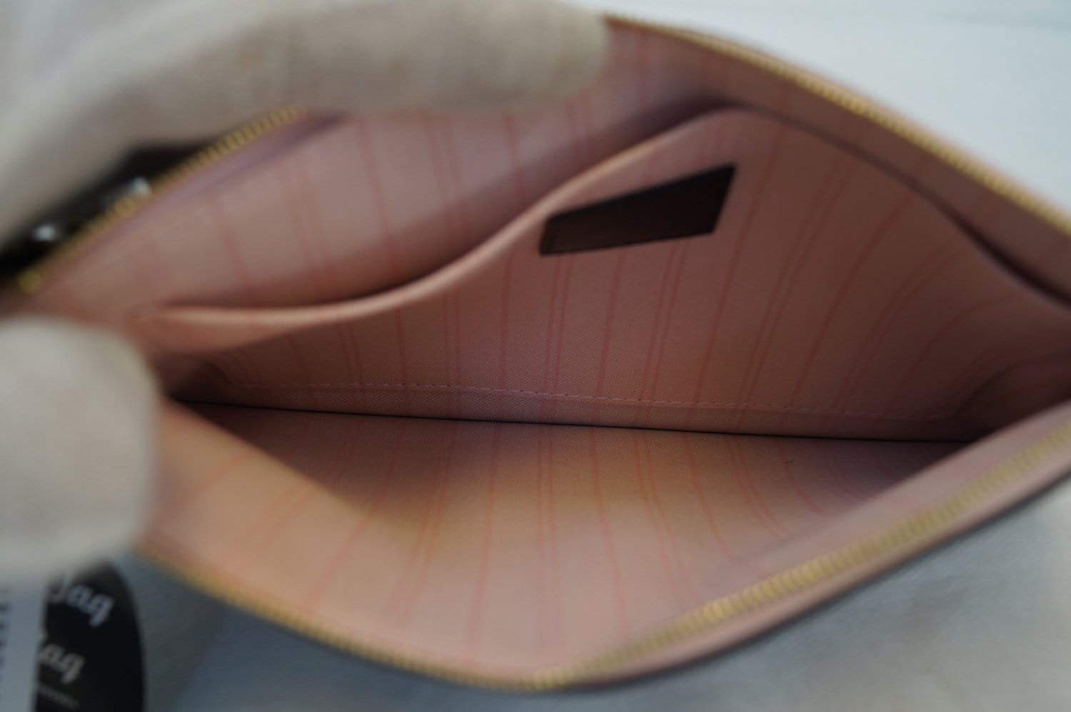 Louis Vuitton Empreinte Neverfull Pochette Pink – DAC