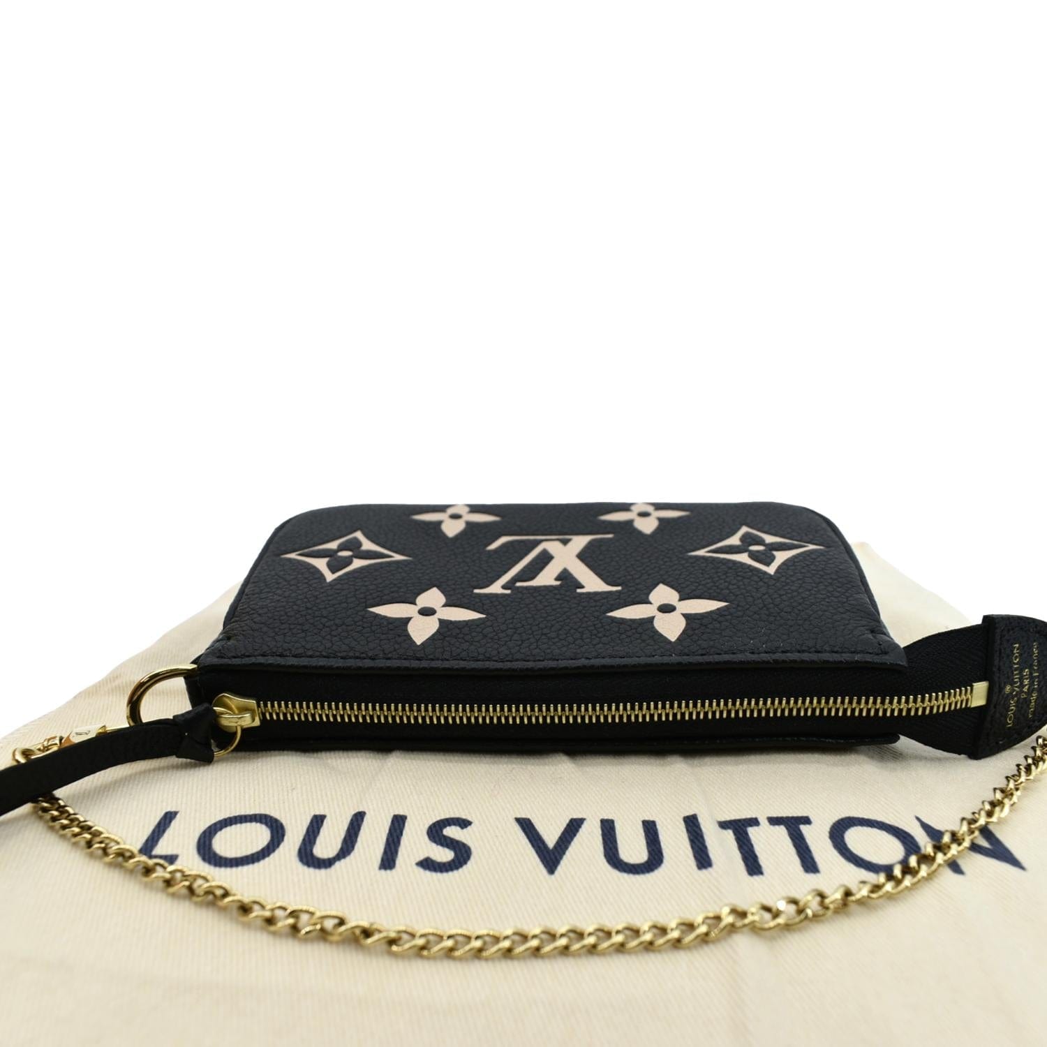 Authentic Louis Vuitton Bicolor Monogram Empreinte Leather Mini Pochette Accessoires