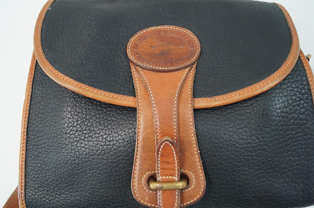 Sold at Auction: GENUINE DOONEY & BOURKE LEATHER PURSE