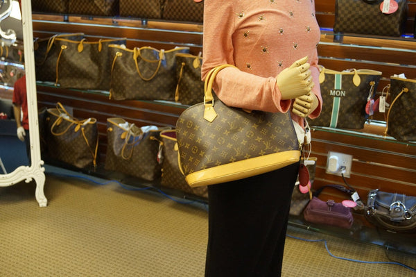 LOUIS VUITTON Monogram Canvas Alma Brown Handbag