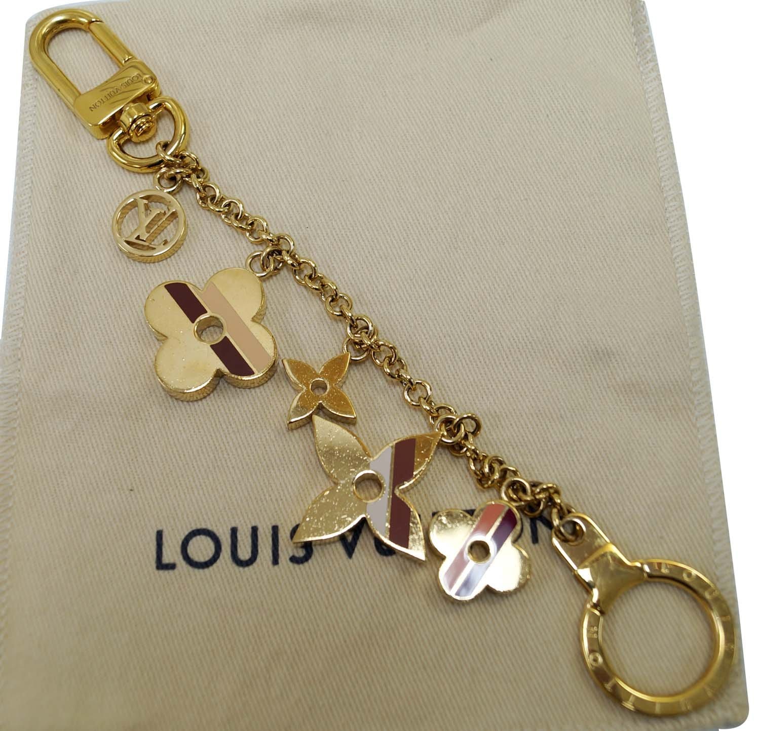Lot - Louis Vuitton Pink & red flower bag charm