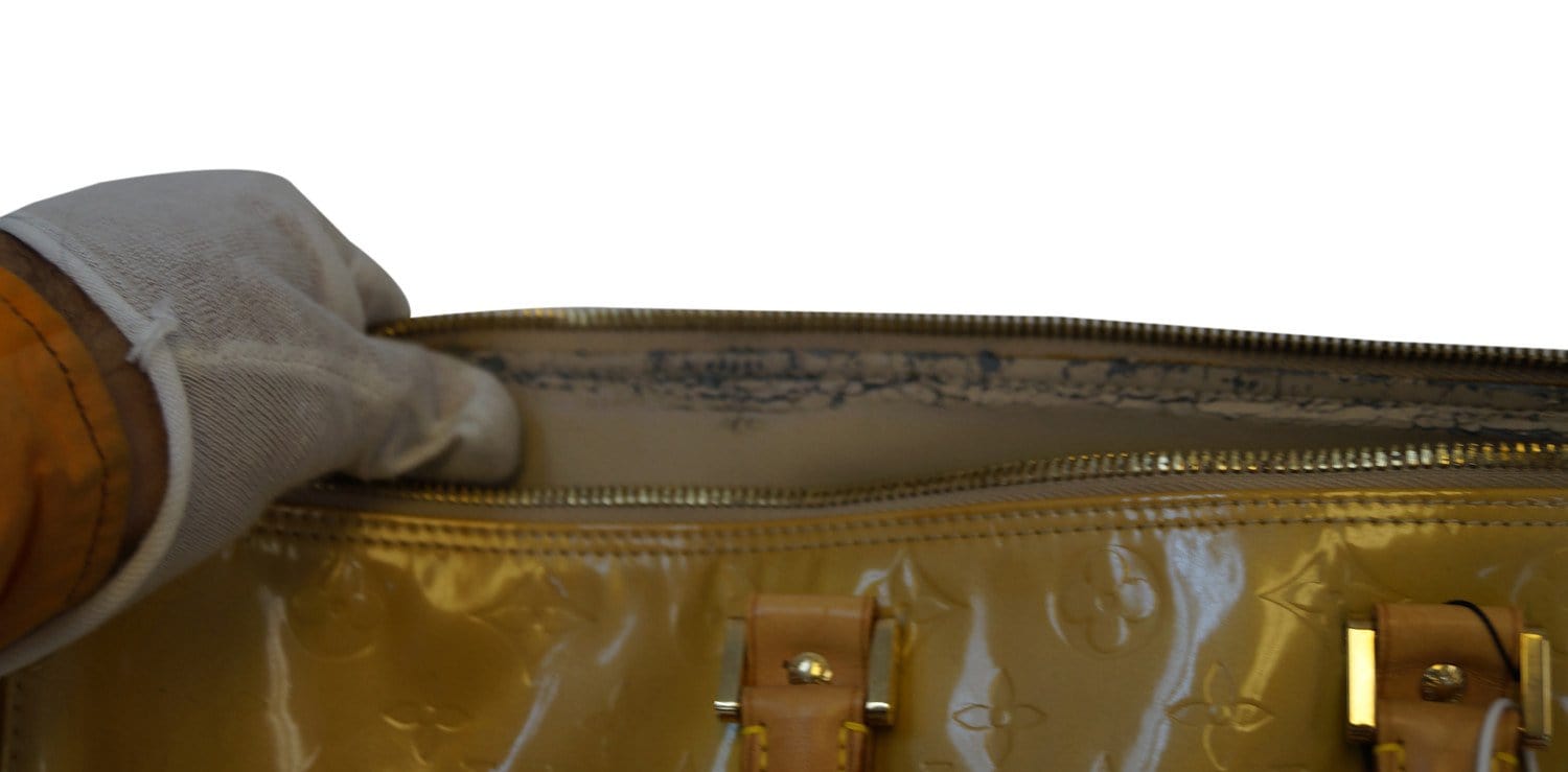 Louis Vuitton Bedford patent leather handbag in yellow is absolutely s