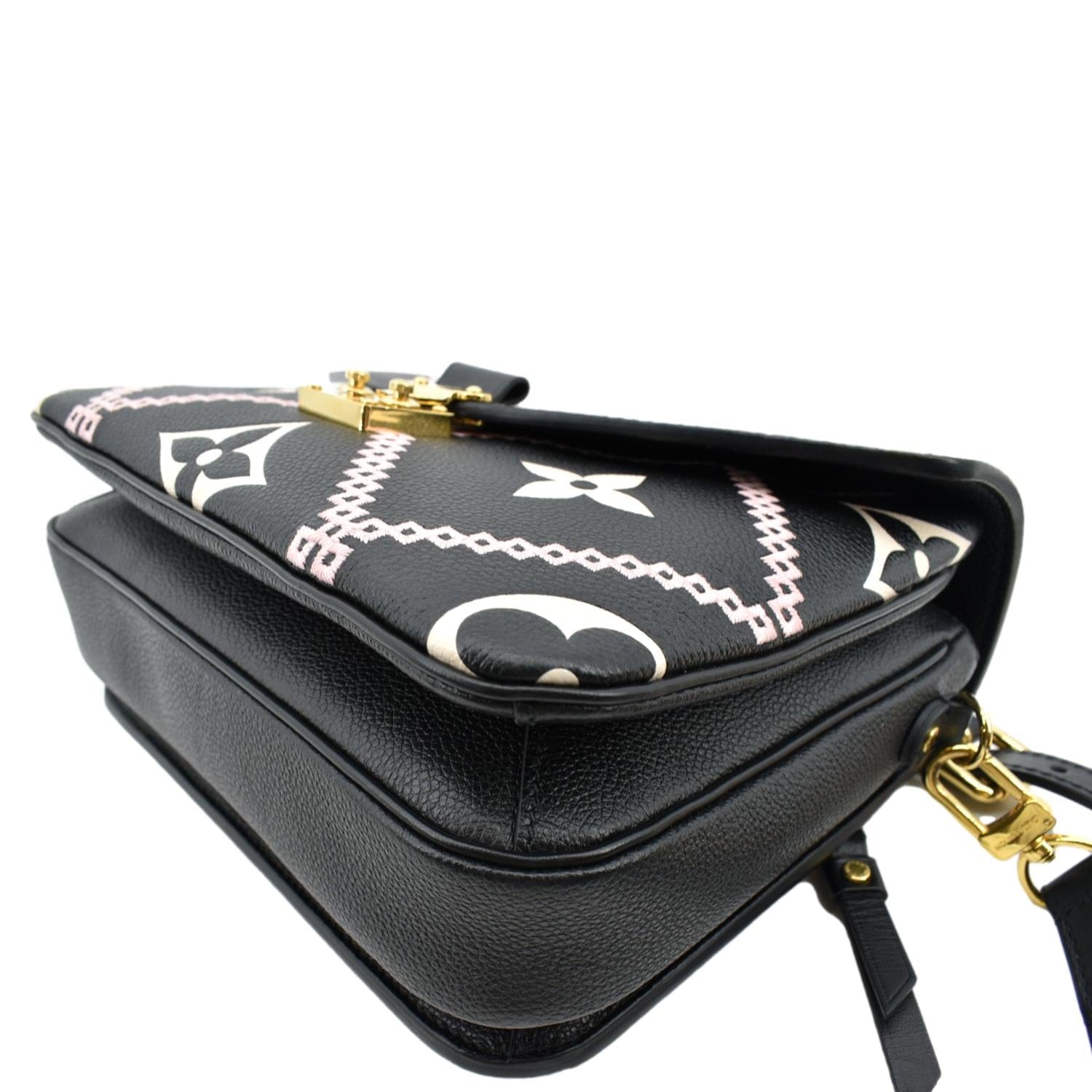 Louis Vuitton on X: Accessorized by an embroidered strap and