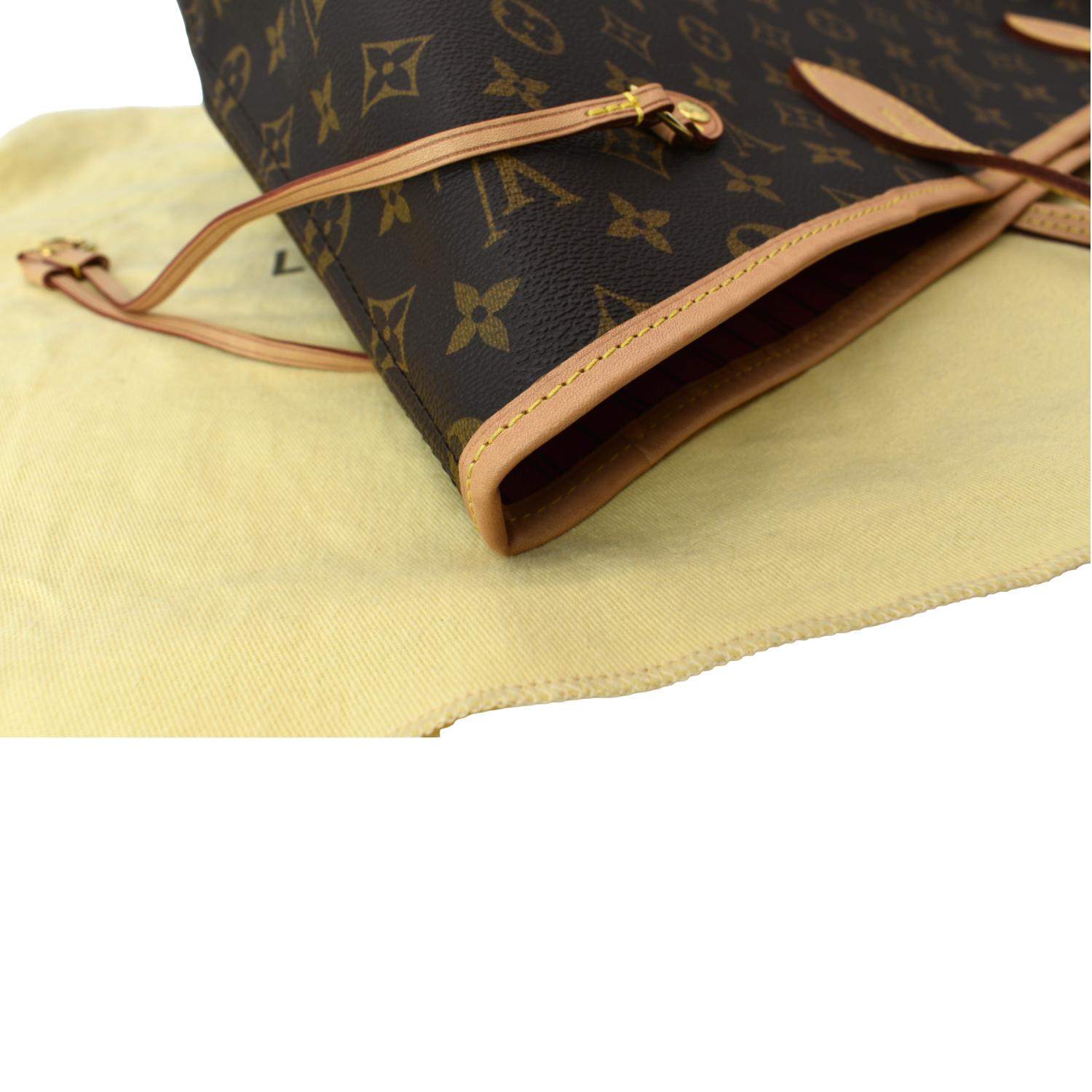 Brown Monogram Canvas with leather handle and hardware. …