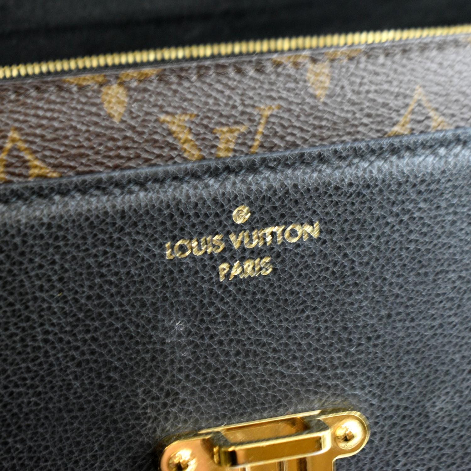 Louis Vuitton Monogram Canvas and Black Leather Victoire Bag For