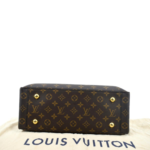 Bolso zurrón Louis Vuitton en tela monogram negra y azafrán y