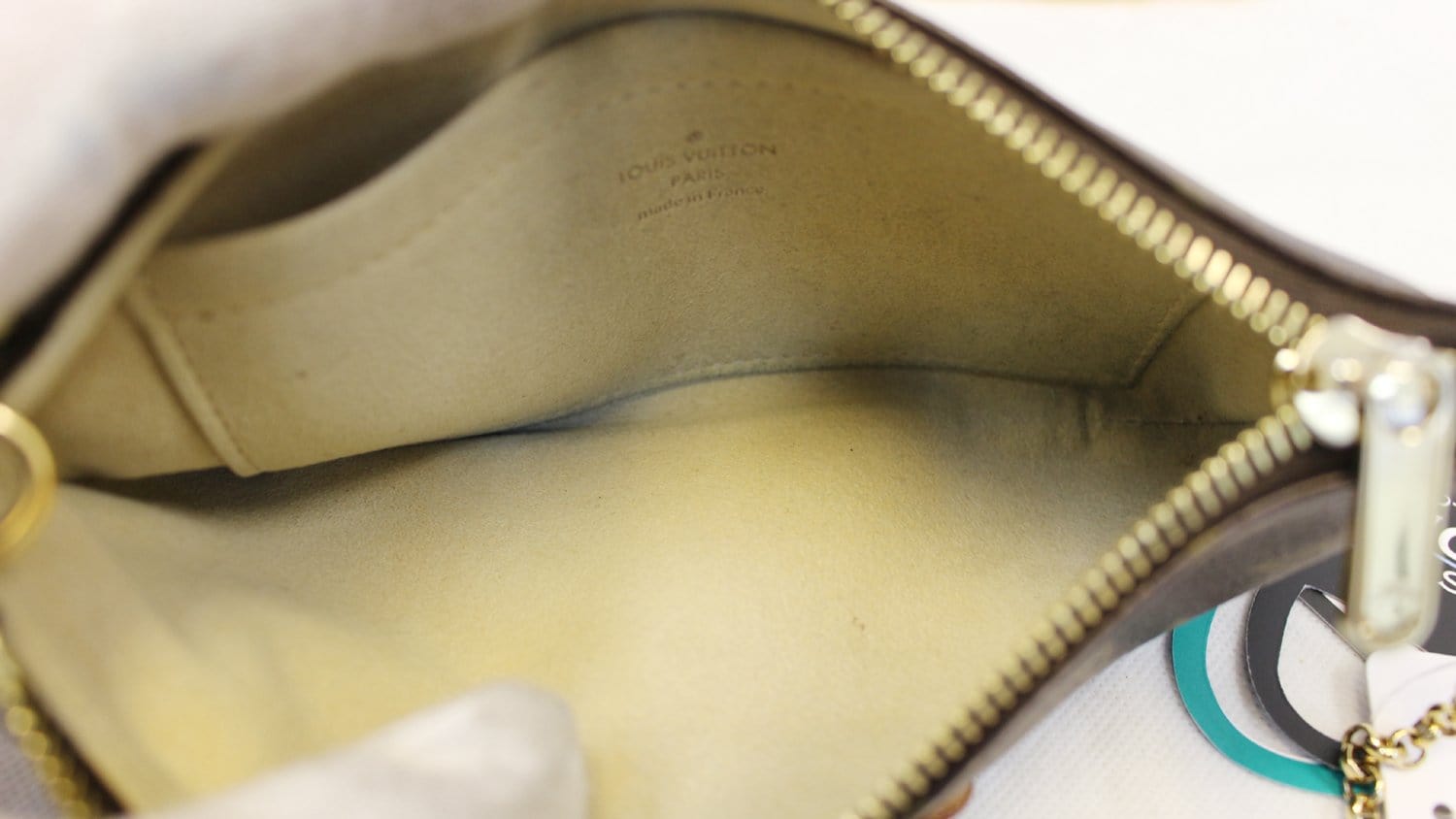 Louis Vuitton Brown Monogram Canvas Milla Pochette Clutch Bag Louis Vuitton  | The Luxury Closet
