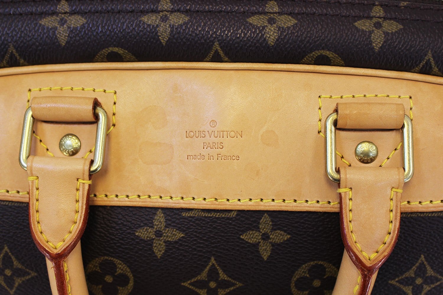 LOT:349  LOUIS VUITTON - a Monogram Evasion travel bag.