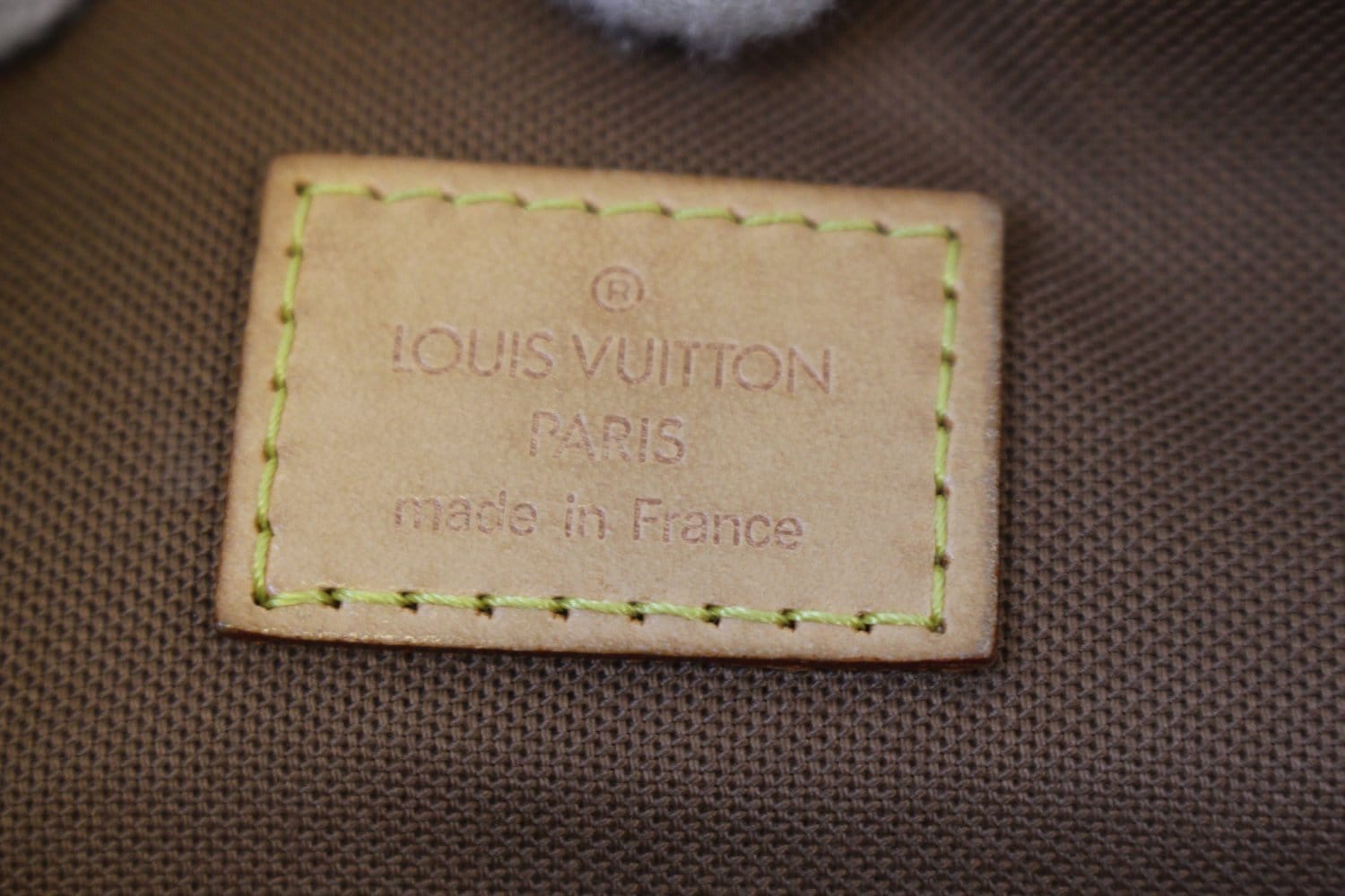Sold at Auction: Louis Vuitton, LOUIS VUITTON, MONOGRAM CANVAS TULUM  SHOULDER BAG, RUBBERIZED COTTON CANVAS IN CLASSIC LOGO PRINT