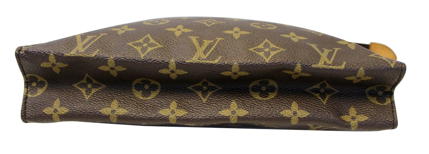 LOUIS VUITTON Monogram canvas hand clutch with leather t…