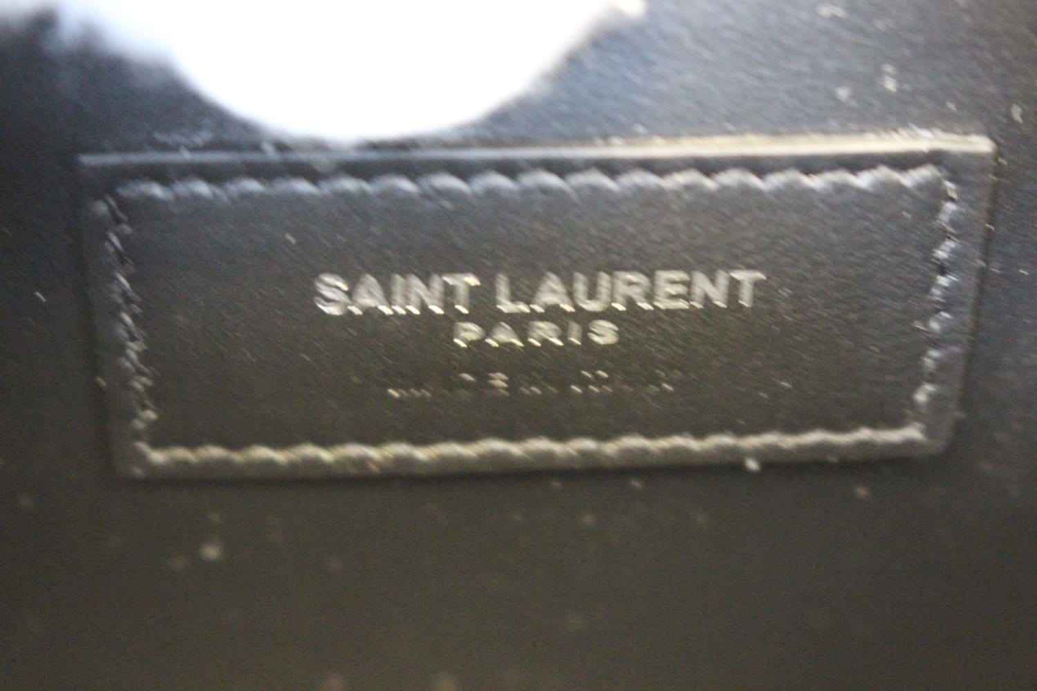 Saint Laurent bag real vs fake. How to spot counterfeit YSL Kate