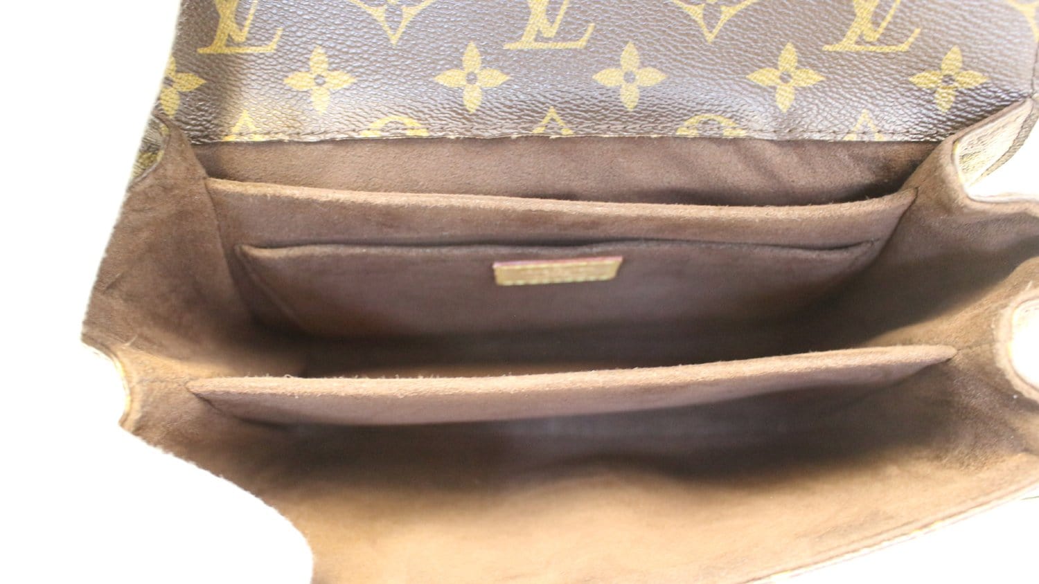 Louis Vuitton, a mongram canvas 'Pochette Metis' handbag, 2013