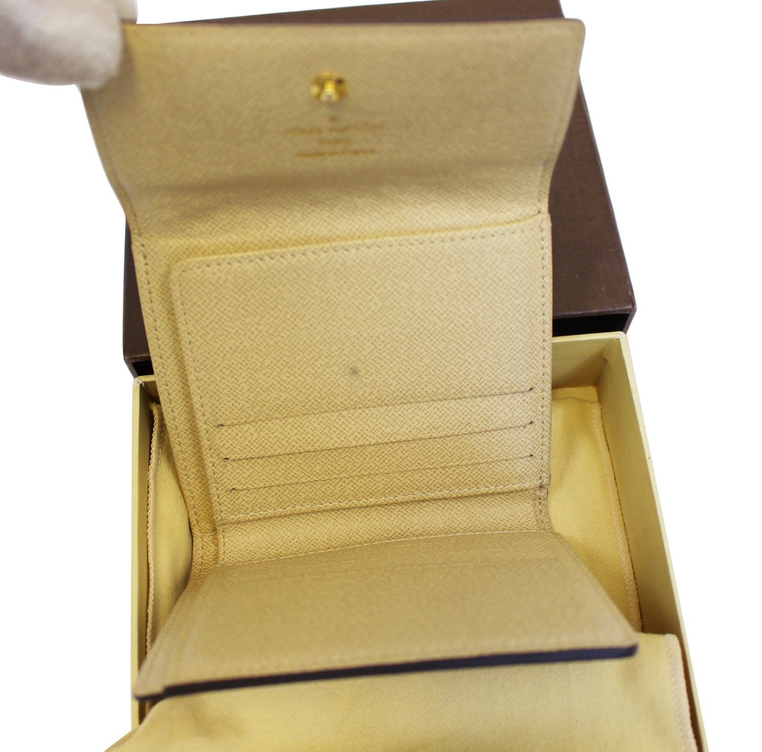 Louis Vuitton Cream Leather International Wallet with leather, gold-tone at  1stDibs