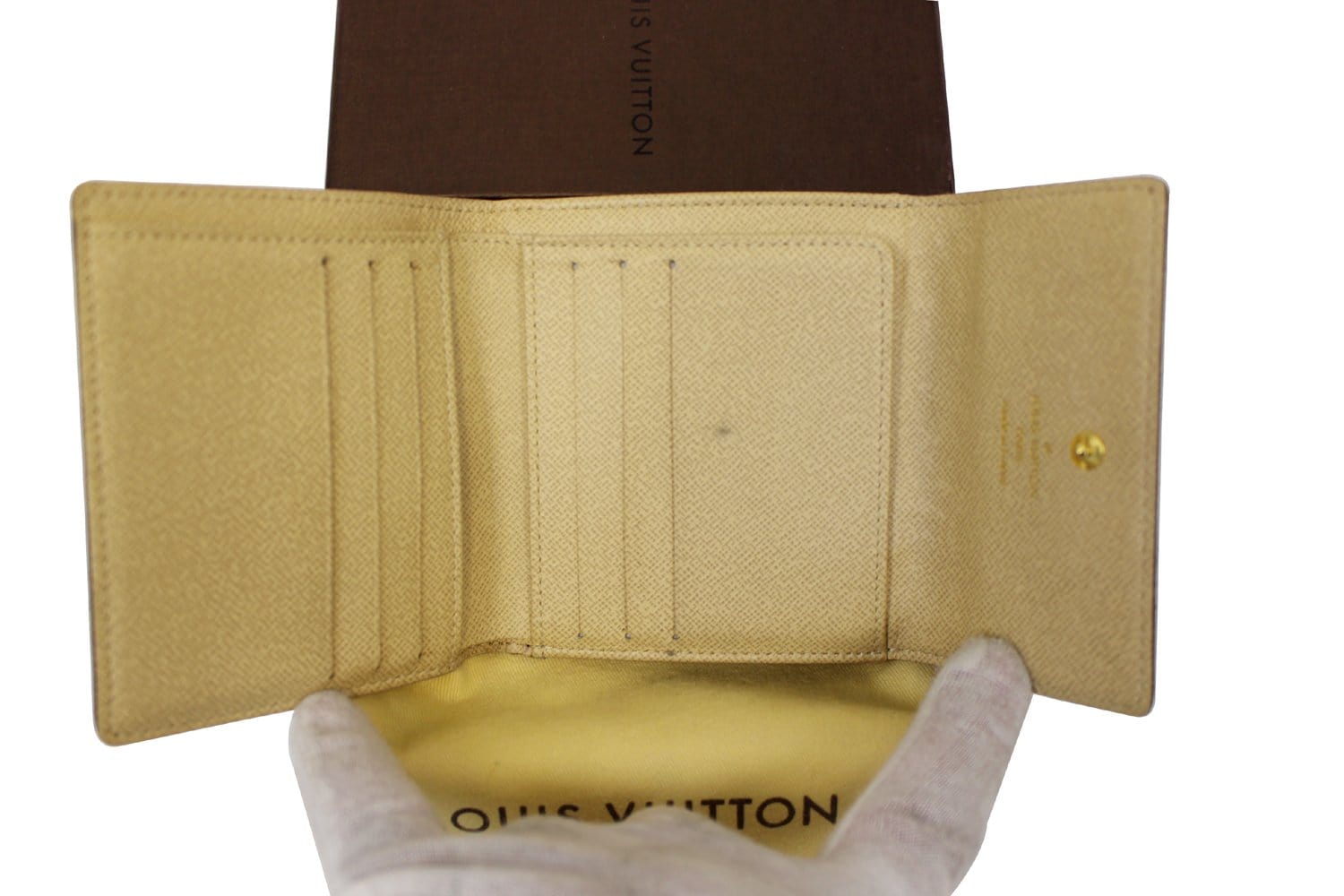 Louis Vuitton Cream Leather International Wallet with leather, gold-tone at  1stDibs