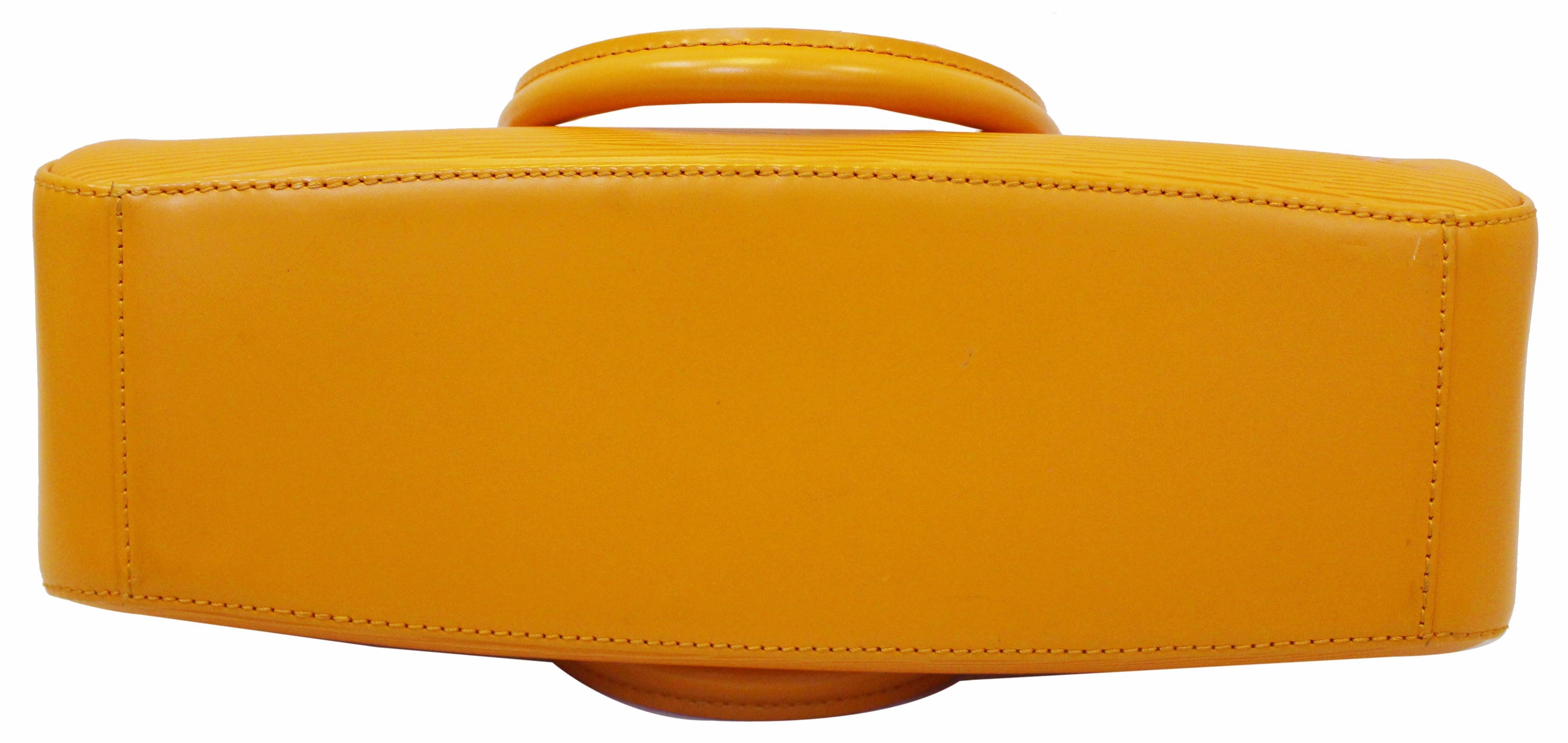 Leather purse Louis Vuitton Yellow in Leather - 37516805